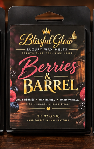 Glow Blissful Berries and Barrel wax melt in black clamshell packaging featuring berry and oak barrel imagery